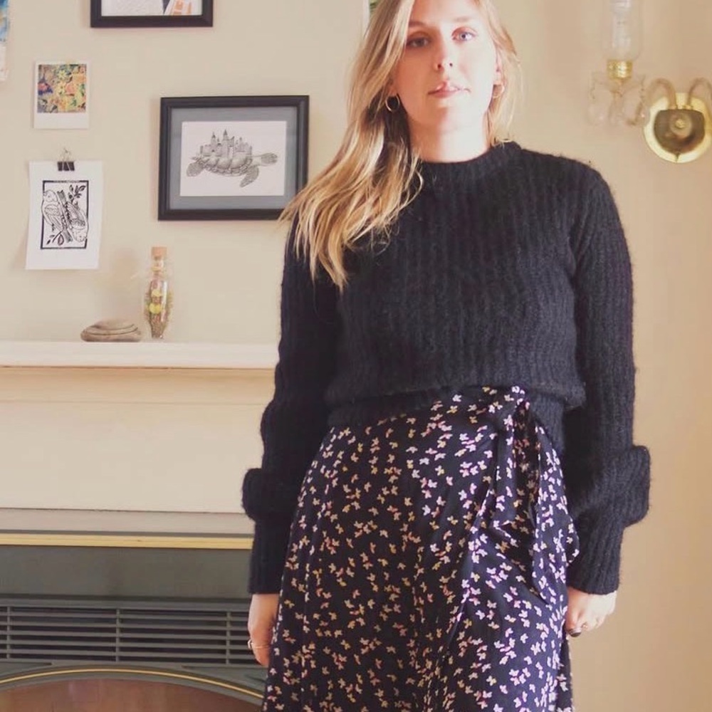 Reformation Black Ribbed Sweater with Navy Floral High-Low Skirt
